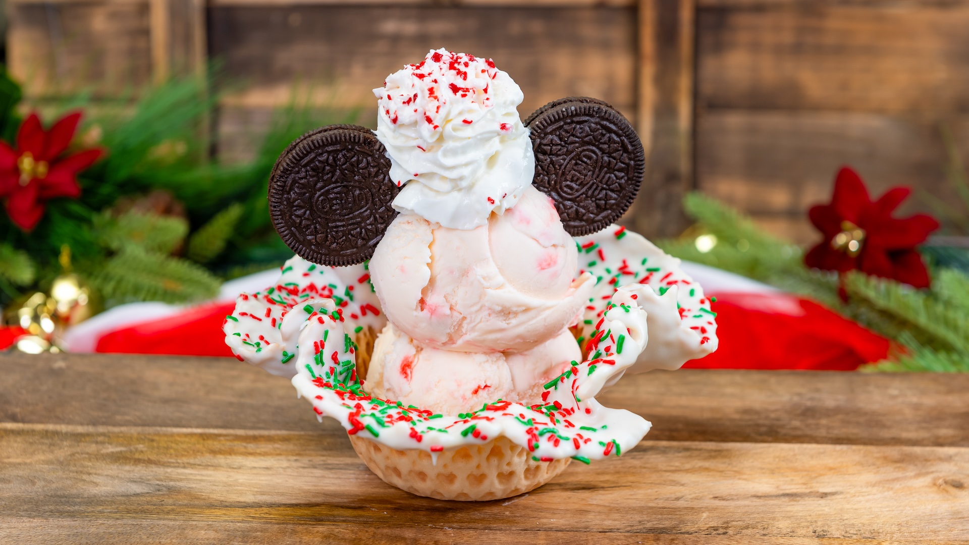 Eggnog Old Fashioned: Buffalo Trace Bourbon, bitters, orange-infused brown sugar syrup, and candied orange peel topped with eggnog cream (Available Nov. 14 through Jan. 7) Carnation Café. Location: Main Street, U.S.A.