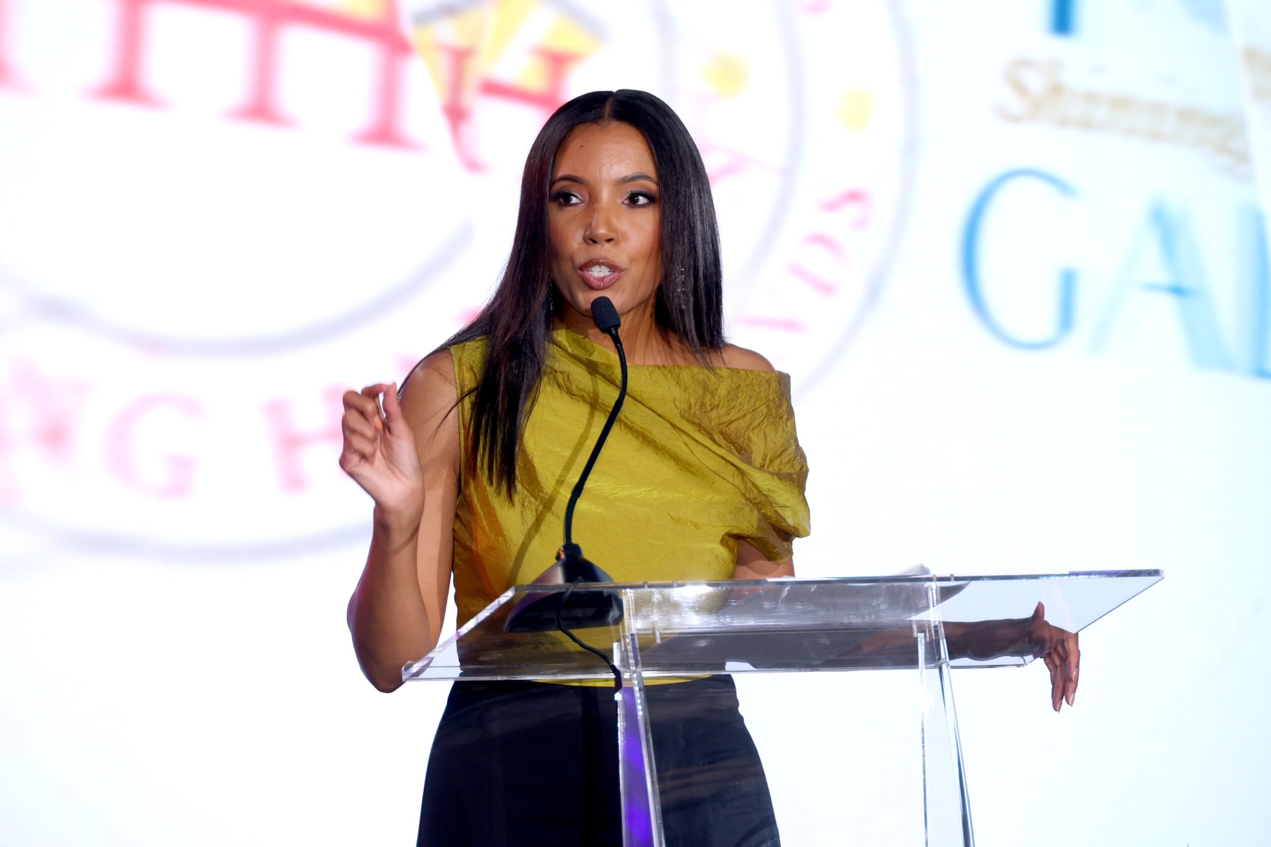 Jasmine Simpkins emcees the Holliday&rsquo;s Helping Hands &ldquo;Waves of Hope&rdquo; Gala in Santa Monica.