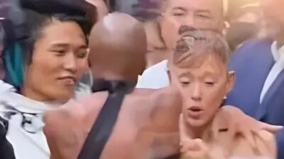 Cynthia Erivo reacting to Arianna Grande being bum-rushed in Singapore - screenshot
