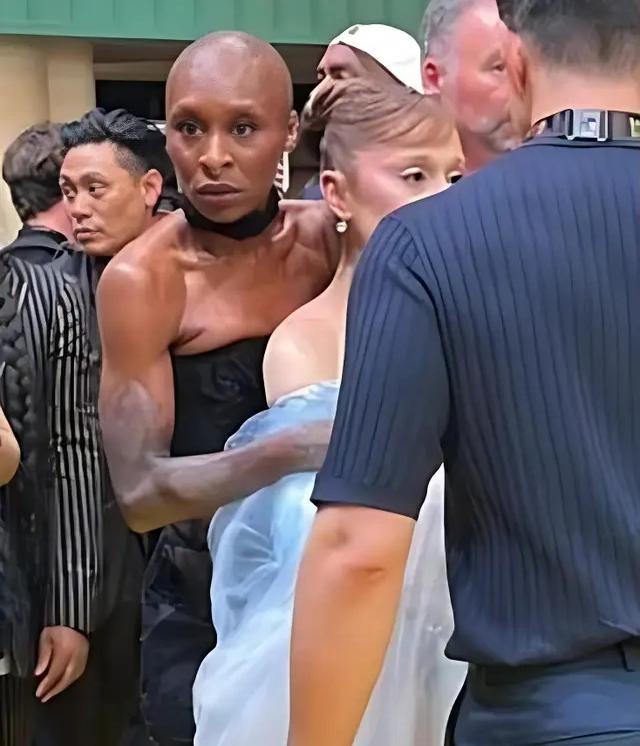 Cynthia Erivo reacting to Arianna Grande being bum-rushed in Singapore - screenshot