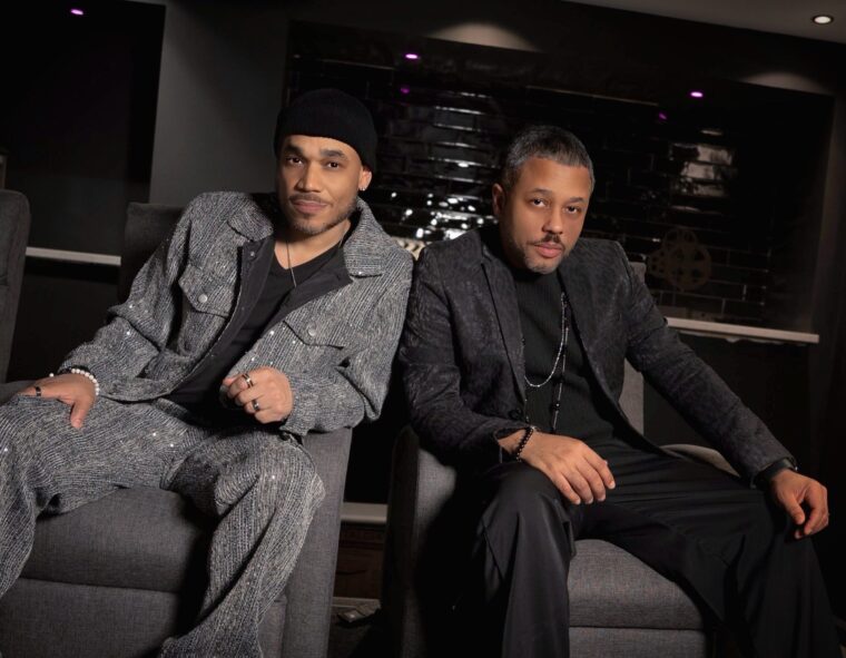 Deondray Gossfield and Quincy LeNear Gossfield seated together in a portrait by Nina LaVoy Photography.