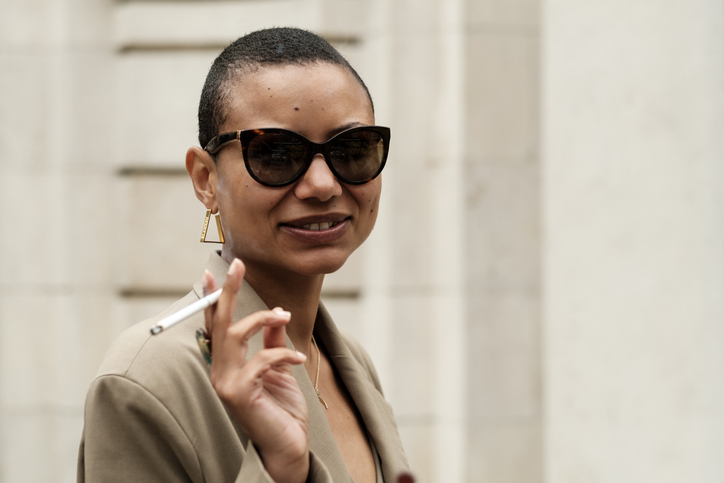 woman holding a cigarette
