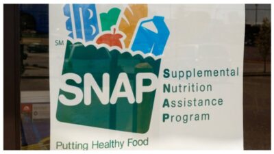 A Sign at a Retailer - We Accept SNAP