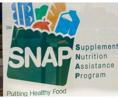 A Sign at a Retailer - We Accept SNAP