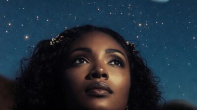 A mystical portrait of a woman looking upward under the stars, with planets like Saturn, Uranus, and Jupiter aligned in the sky above her