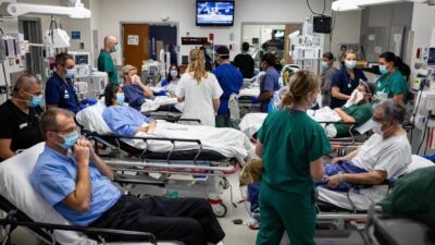 Healthcare workers face intense pressure as flu cases overwhelm hospitals nationwide