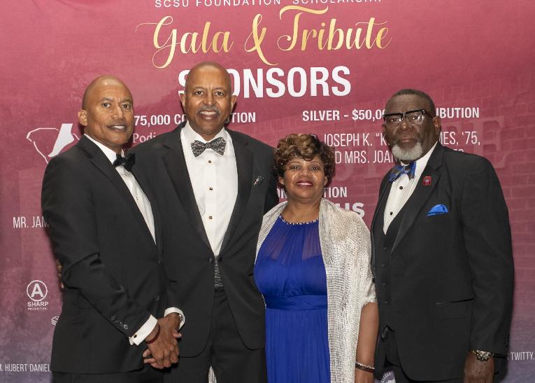  North Star Honoree Andre Rice, ’78, celebrates his recognition alongside family members, including his brother Philip Rice, ’86, and cousins Walter and Felicia Busby. Walter is a proud 1986 alumnus.