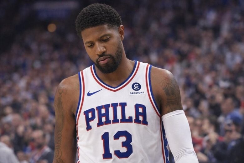 Paul George walking off the court, looking disappointed - via eurAI