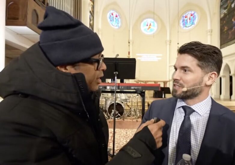 On the scene of a protest Lemon speaks to Jonathan Parnell, the leader of Cities Church - via screenshot