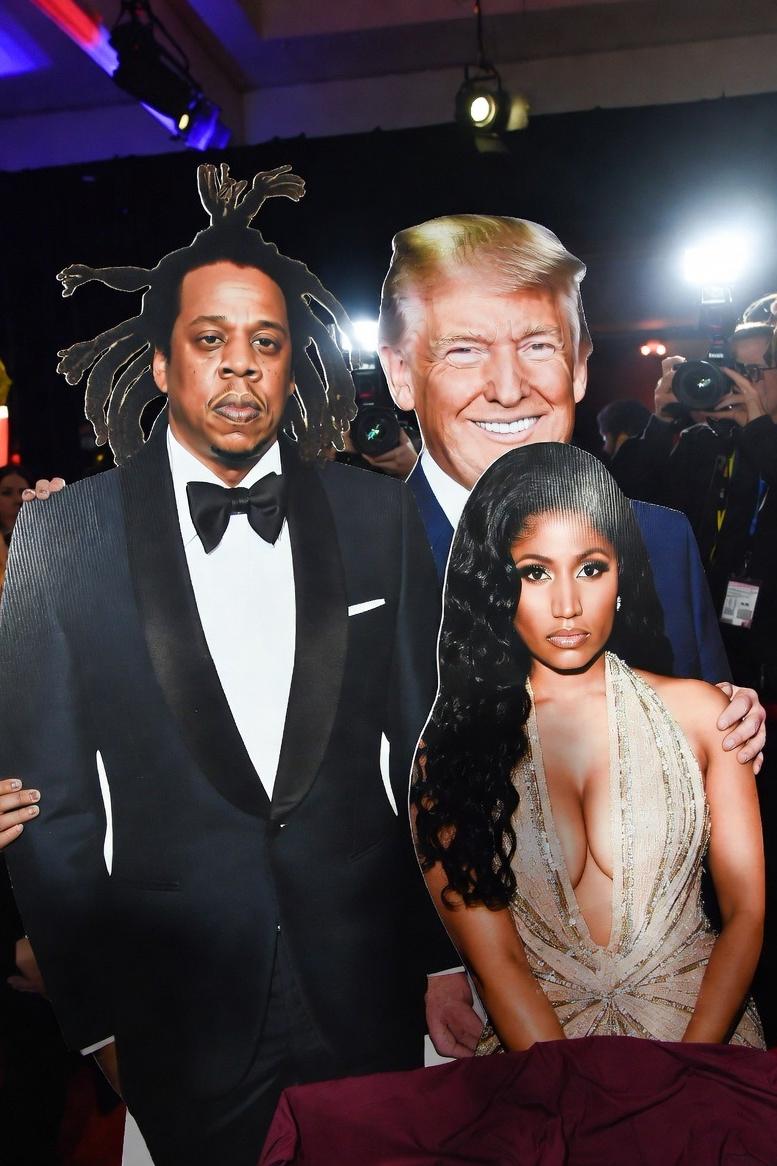 Cardboard cutouts of Jay-Z, Nicki Minaj - via eurAI