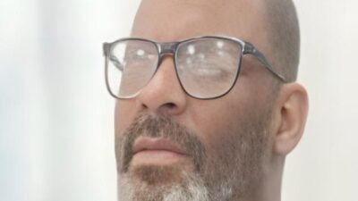 R Kelly (headshot photo - from prison) - via Instagram