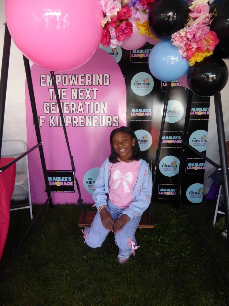 Young book author at Festival of Books: Photo Credit, Ricky Richardson