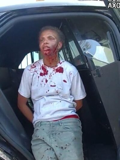 Erin Cowser after being body-slammed by cop - via bodycam footage