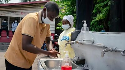 A man washes his hands before being screened to enter Kyeshero Hospital in Goma, Congo, on 05-18-26 - Jospin Mwisha-AFP via Getty