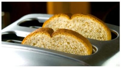 Bread popping up of toaster