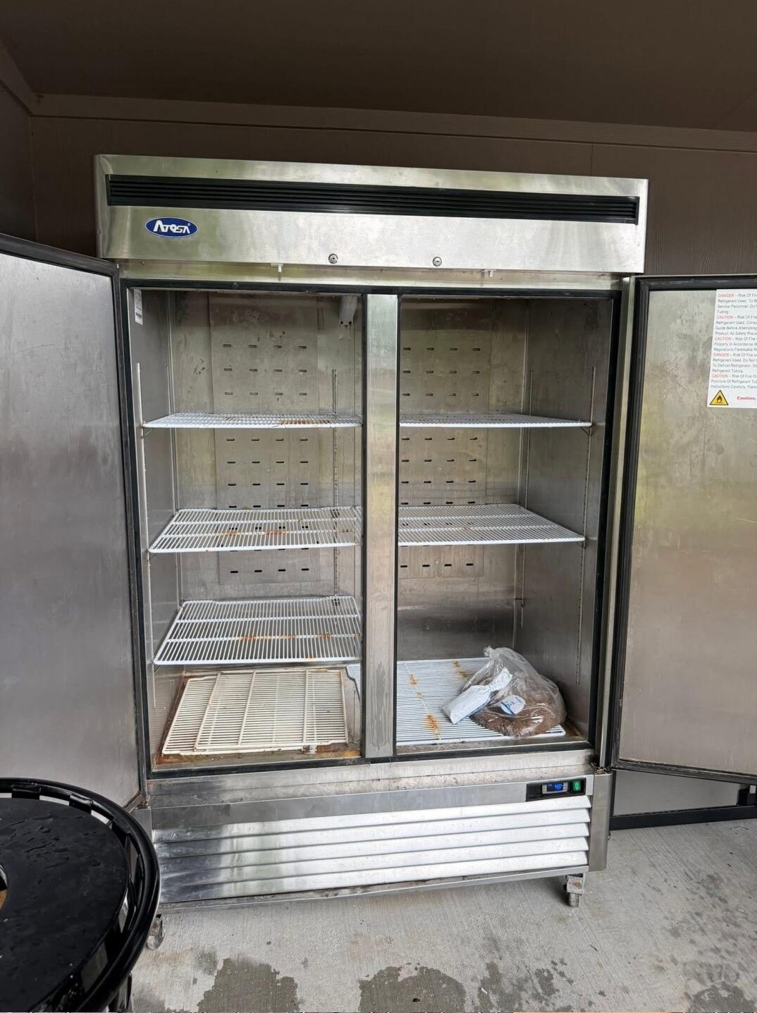 Opelousas community pantry fridge (empty) - via Brashawnee Johnson