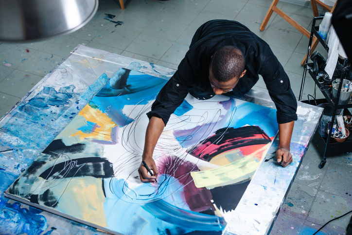 black man drawing