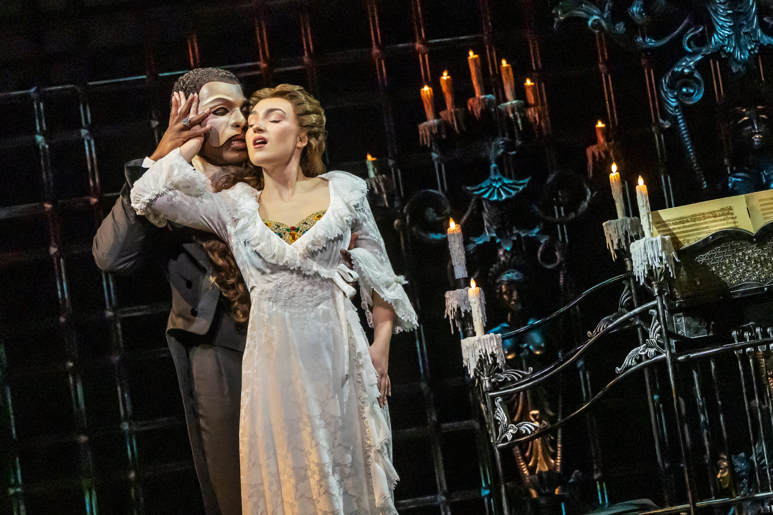 Isaiah Bailey as The Phantom and Jordan Lee Gilbert as Christine Daaé in Phantom of the Opera North American Tour. Photo: Matthew Murphy and Evan Zimmerman