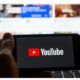 YouTube logo on smartphone