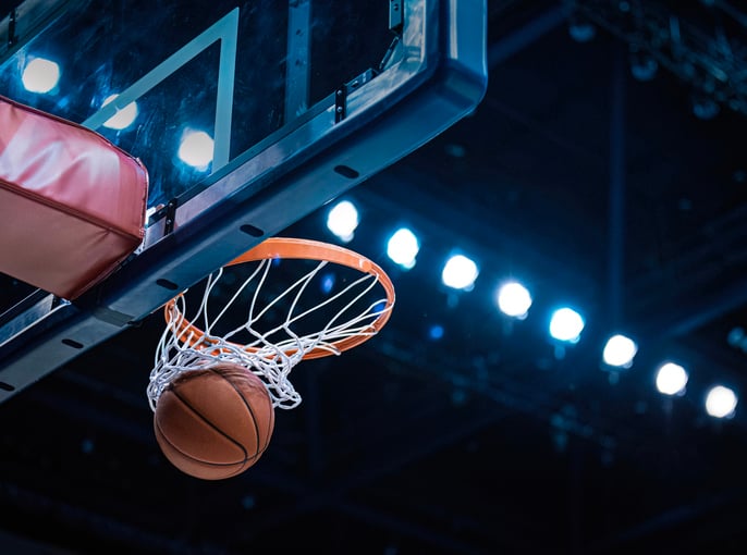 Basketball scoring a basket
