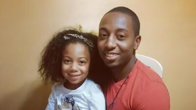 Ailea Brown, at age 5, celebrates Christmas 2014 with her father, Durrell Williams - (Photo courtesy of Durrell Williams)
