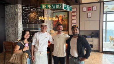 Anthony Head (far right), chef and friends at Pizza Bar on 38th (Instagram)
