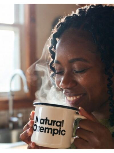 black woman drinking warm beverage AI generated