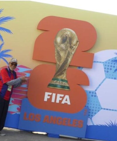 Ricky Richardson in front of the FIFA Fan Festival signage
