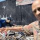 Earl Ofari Hutchinson (at garbage dump in South LA)