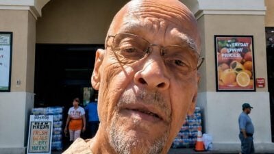 Earl Ofari Hutchinson (in front of Superior Grocers) - screenshot