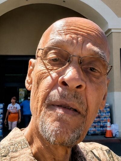 Earl Ofari Hutchinson (in front of Superior Grocers) - screenshot