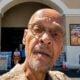 Earl Ofari Hutchinson (in front of Superior Grocers) - screenshot