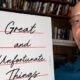 Earl Ofari Hutchinson with copy of Jason Arday's Autobiography 'Great and Unfortunate Things'