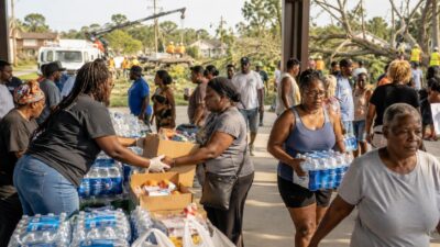 Gary (Indiana) residents receiving food and supplies during power outage relief effort - via eurAI