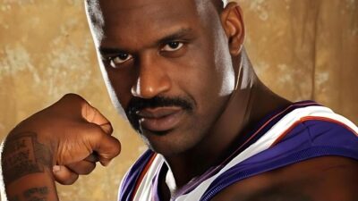 Shaq shows off muscles and tattoos
