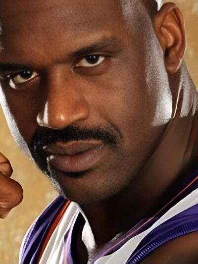 Shaq shows off muscles and tattoos