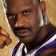 Shaq shows off muscles and tattoos
