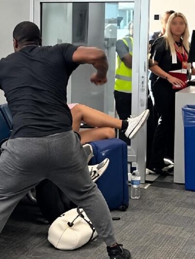 Black airport traveler punching white man during racial incident