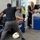Black airport traveler punching white man during racial incident