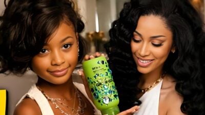 Cardi B (right) and her daughter Kulture (left) - via YouTubeHip Hop World