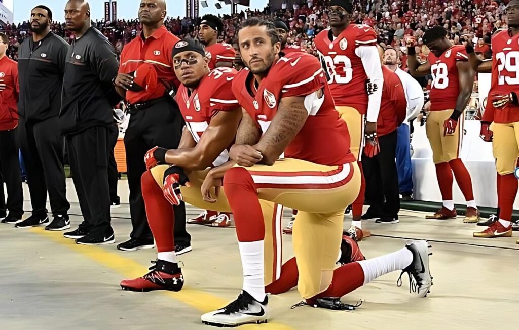 Eric Reed and Colin Kaepernick kneeling - Getty