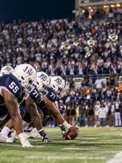 HBCU football teams facing off under stadium lights - via eurAI