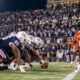 HBCU football teams facing off under stadium lights - via eurAI