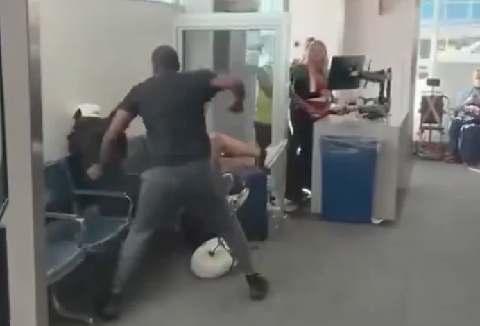 Black Traveler Punches Man After Airport Exchange Turns Racial | WATCH