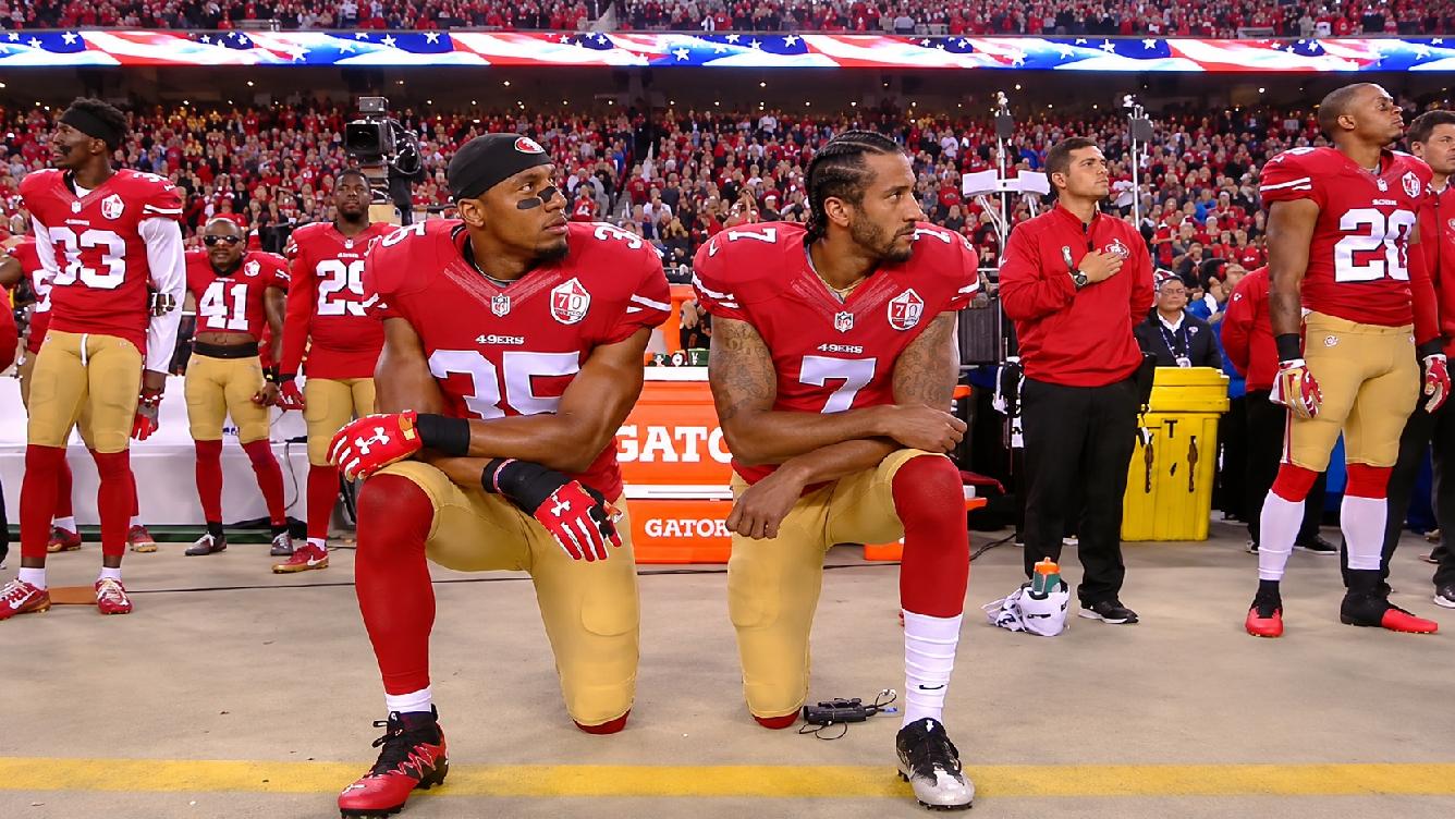 Eric Reid and Colin Kaepernick kneeling - screenshot