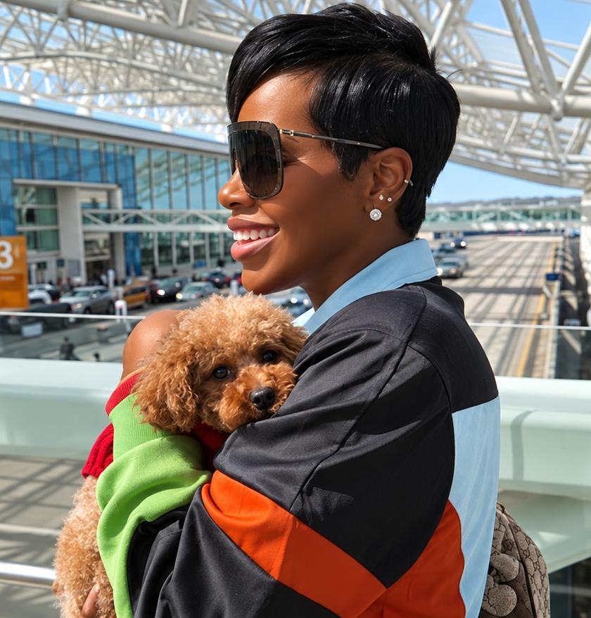 Fantasia and poodle - via Instagram @fantasia