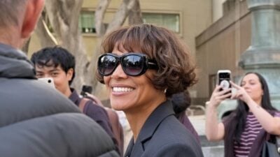 Halle Berry smiling after leaving court