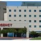 Modern hospital building in front of Emergency entrance