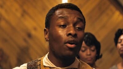 Sammie 'Preacher Boy' Moore's guitar scene from 'Sinners' - via screenshot