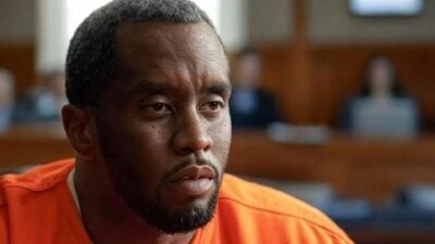Sean Diddy Combs (with gray hair & beard) - via eurAI